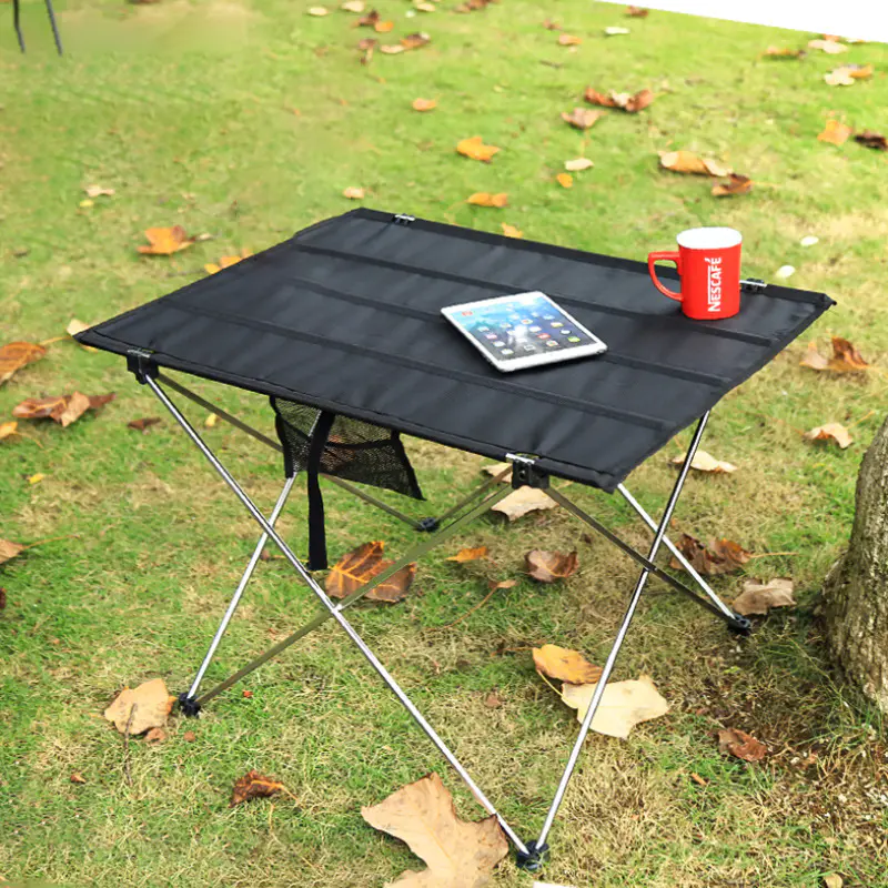 Discover a Waterproof Camping Table designed for outdoor cooking, camping, picnics, and travel with a durable and easy-to-clean surface.